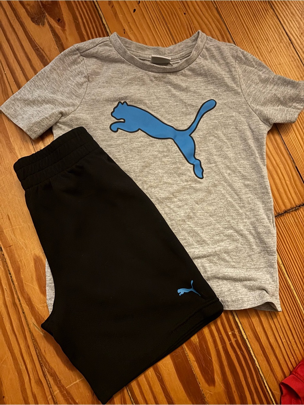 Puma Kids Black Shorts with Blue Puma Logo